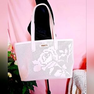 Vince Camuto large tote bag in Shade Betwewn pink and beige.